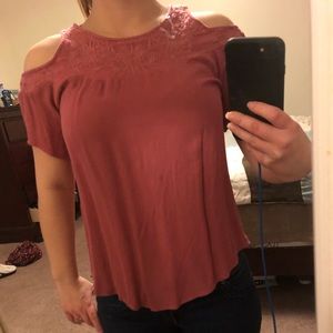 Pink shirt with shoulder cut out